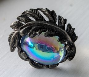Vintage Aurora Borealis Cabochon clip on Oval Earrings by Coro Prestige.