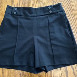 Black pleated mini skirt short with button detail and side zipper SIZE XS 