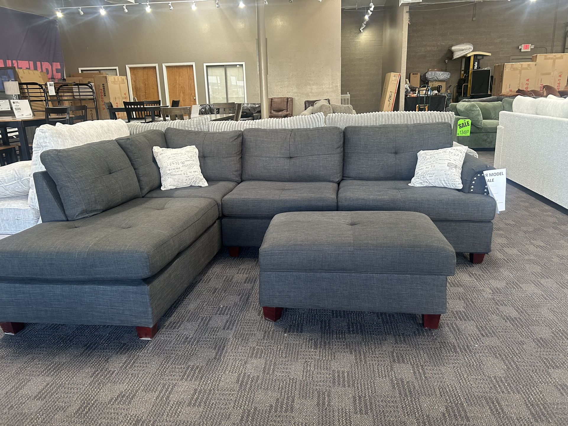 Black Linen Sectional And Ottoman