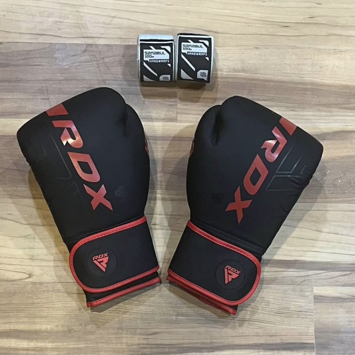 RDX Boxing Gloves and Sanabul Wraps