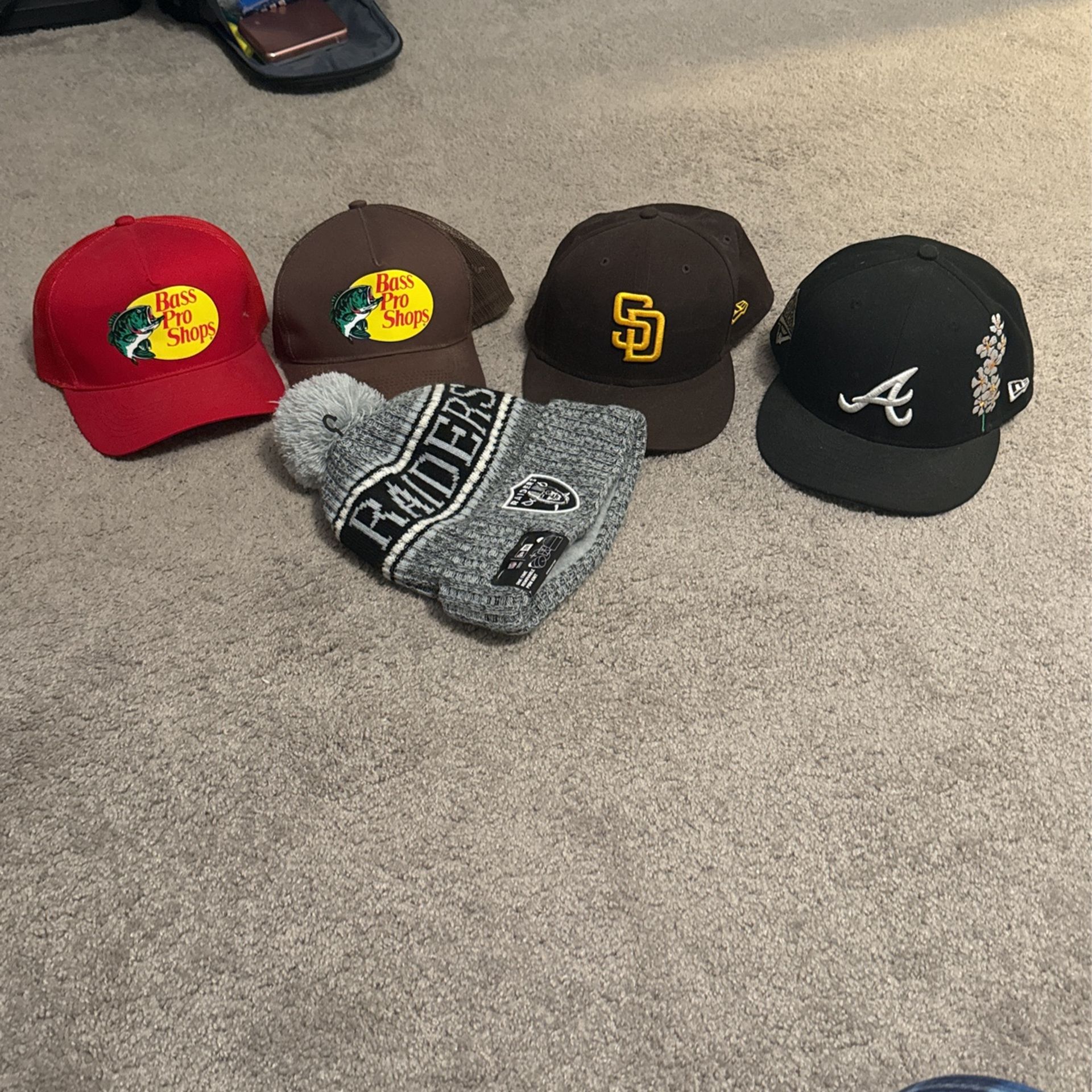 fitted hats and bass pro shop hats and raiders beanie