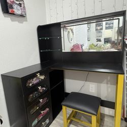 Black vanity desk with mirror
