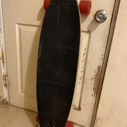 Longboard With Road Rippers