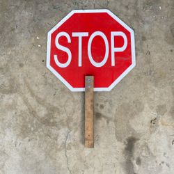 Stop Slow Handheld Sign Used