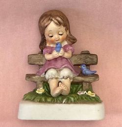 Vintage porcelain figurine girl with blue birds on bench Treasure Masters Korea