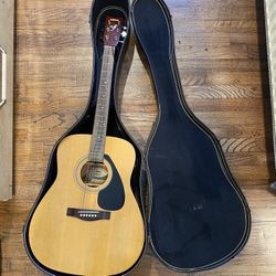YAMAHA ACOUSTIC GUITAR  F-310. Used  one string loose. In good condition 