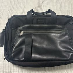 Gently used TUMI Briefcase