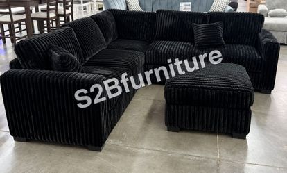 Neew Black sectional.sofaa w ottoma