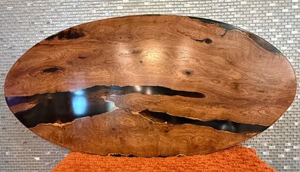 Gorgeous oval coffee table set, handmade from solid Mesquite wood filled with black smoked epoxy resin