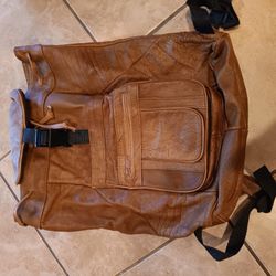 $25 Leather Backpack, Very Good Condition. Lot of Pockets and Zipper Pockets. 