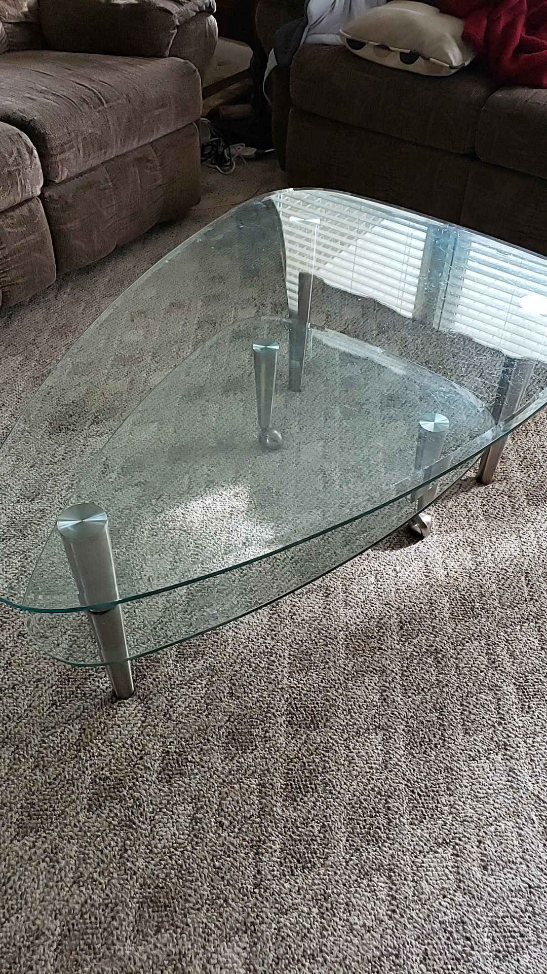Triangular glass coffee table