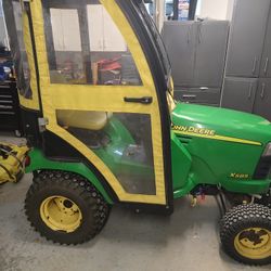 JOHN DEERE X585

Tractor 4 wheel drive with 54 inch deck and snow blower. 