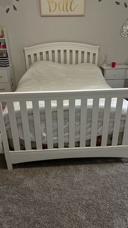 Full size bed frame. (Headboard, footboard, and Support wooden slats.)