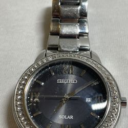 Seiko Women's Solar Watch – V137-0BS0 – Black Dial with Crystal Bezel – Works