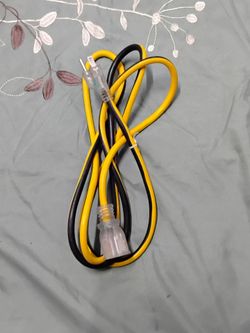 7 Foot All Weather Extension Cord Yellow Black Clear Ends