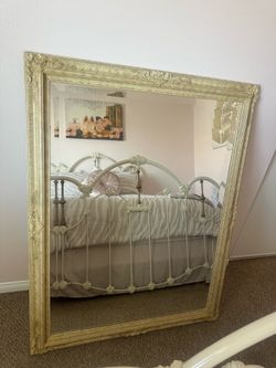 Beige antique mirror