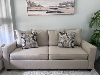 Beige Sofa with Accent Pillows