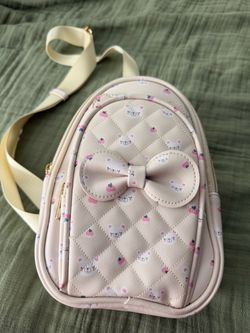 Pink Quilted Crossbody Backpack with Bow
