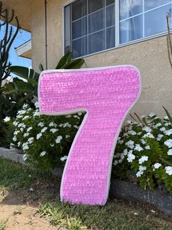 Pink and white number seven pinata numero siete