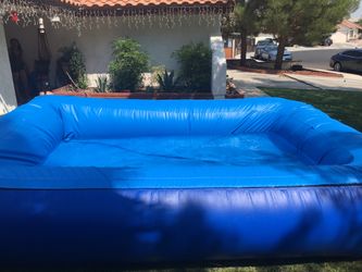 Pool 15 feet long by 10 feet wide by 29 inches deep