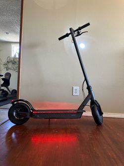 Black electric scooter 25 mile range
