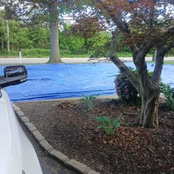 Free 40 X 60 LIGHT BLUE TARP MESSILY ROLLED UP