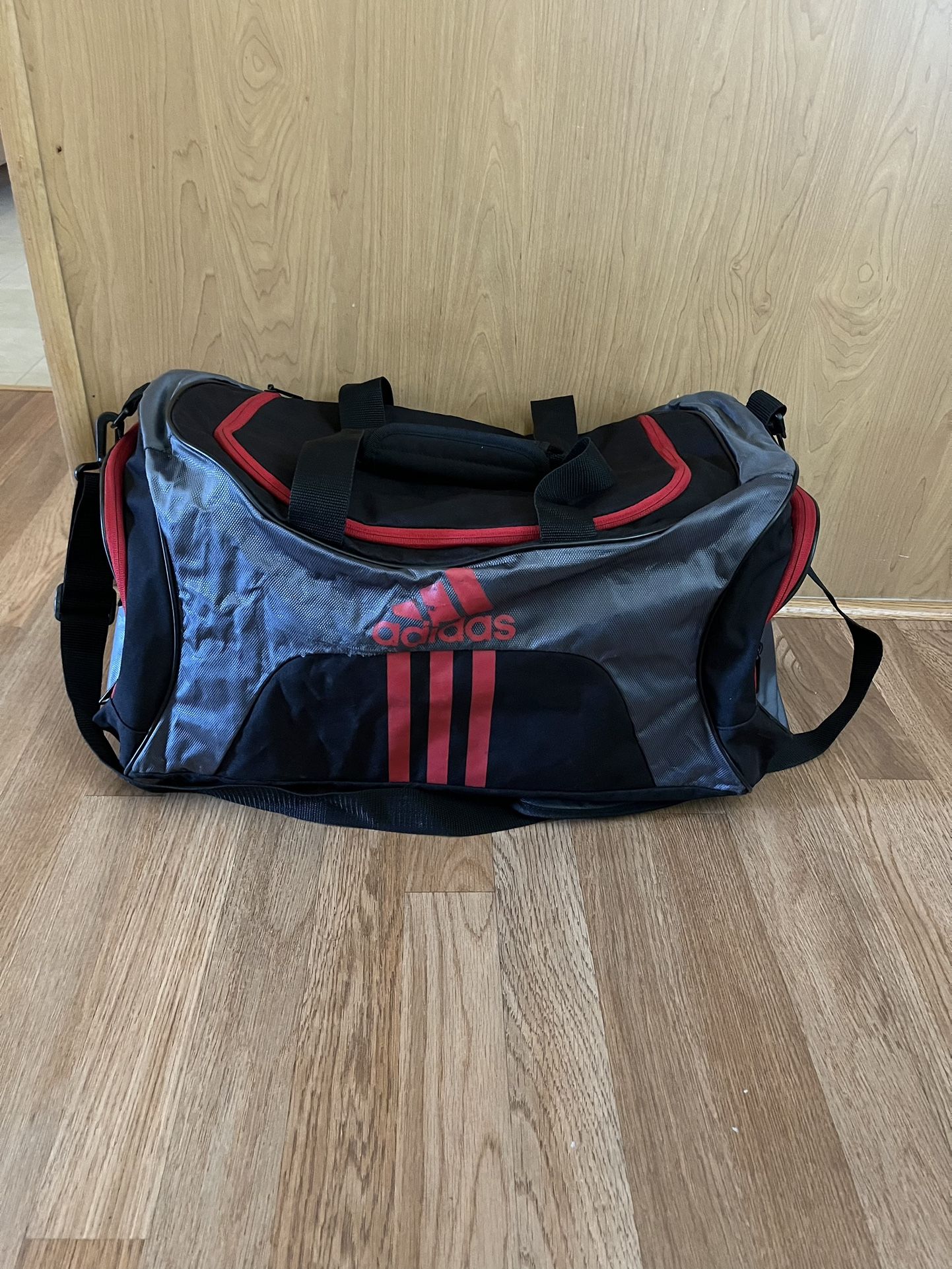 Adidas red gray duffle bag