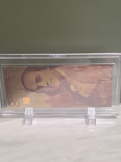 1g Gold Geiger Bar in display case