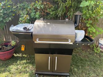 Shop Z GRILLS 1056 sq. in. Pellet Grill and Smoker in Bronze with Storage Cabinet, Includes Cover