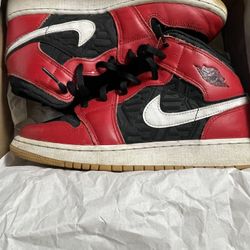 Black and red Jordan one