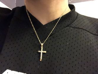 14k Jesus Piece and figaro link chain, in yellow gold