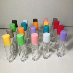 20 Empty Perfume Glass Bottles.  Can be used as roll on for oils and perfumes or can remove roll on and use for arts, craft storage, sand from differe