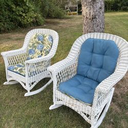 $100  FOR BOTH!!  2  WHITE WICKER ROCKING CHAIRS W/ CUSHIONS