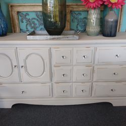 Light Gray Dresser With Doors And Crystal Knobs