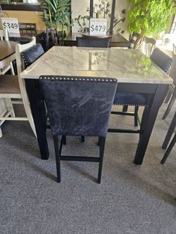 Brand new 42"×42"×36"H white faux marble counter high table + 4 black velvet chairs