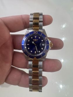 Mens invicta watch.   Like new.