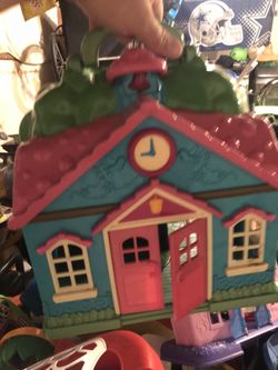 Random kids toys and rocking chair