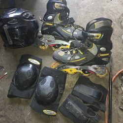 Size 8.5 Rollerblades,helmet And Pads.