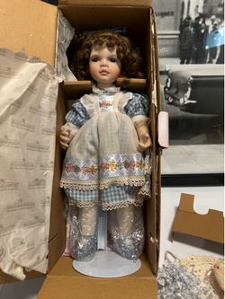 The Ashton-Drake Galleries “Gwendolyn” porcelain doll by Sandy Freeman