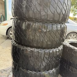 35x12.50R22 4 used tires M/T