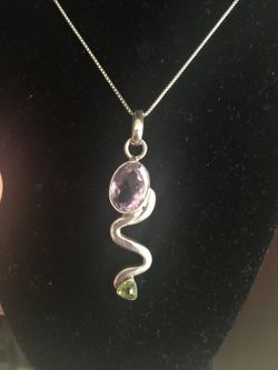 925 Italy Sterling silver necklace with snake charm amethyst and green Ruby stones. 9 grams and 18" inches $15