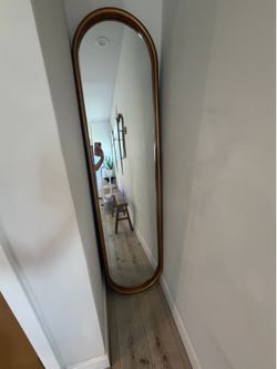 Long gold mirror