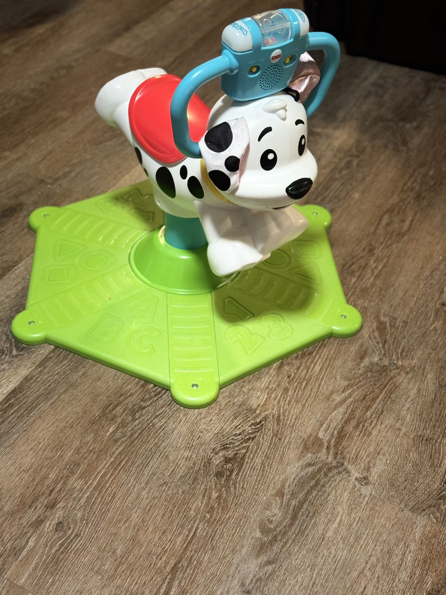 Fisher-Price bounce ride-on dog