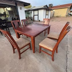 Solid wood dinner table and 6 chairs,can deliver