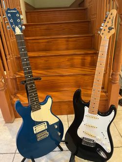 Washburn Lyon Vintage Stratocaster and First Act Guitar
