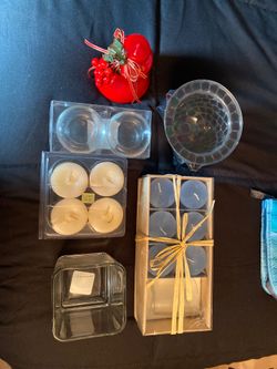 Various candles and holders