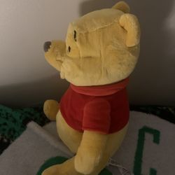 One Winnie the Pooh plush toy.