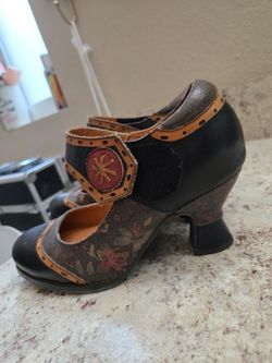 Leather heels designer  size 6