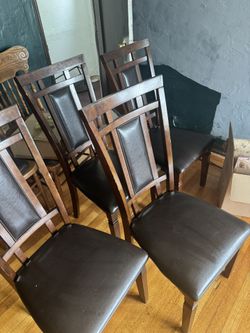 Set Of Four Wooden Dining Chairs