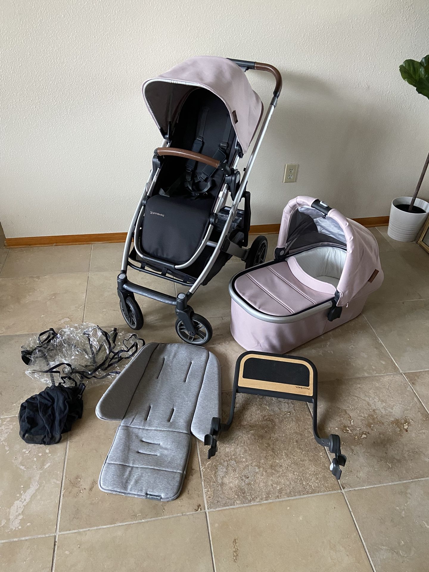 Uppababy Cruz V2 Stroller With Bassinet And Piggyback Board Pink